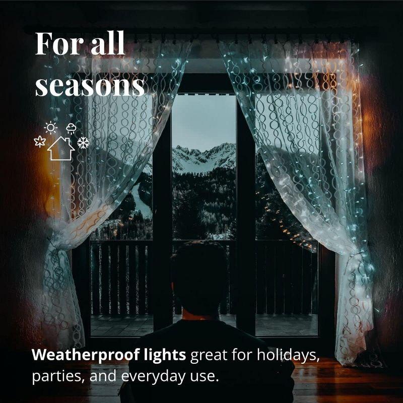 Twinkly Curtain App-Controlled LED Christmas Lights with 210 RGB+W (16 Million Colors + Warm White) LEDs. 5 by 7 feet. Clear Wire