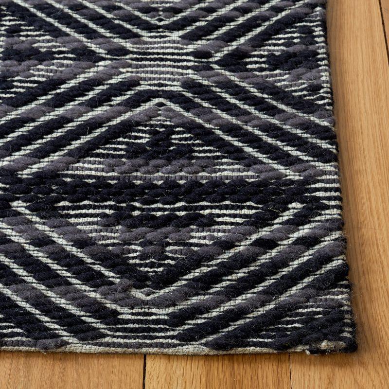 Marbella MRB451 Hand Loomed Area Rug - Black/Ivory - 6'x9' - Safavieh.