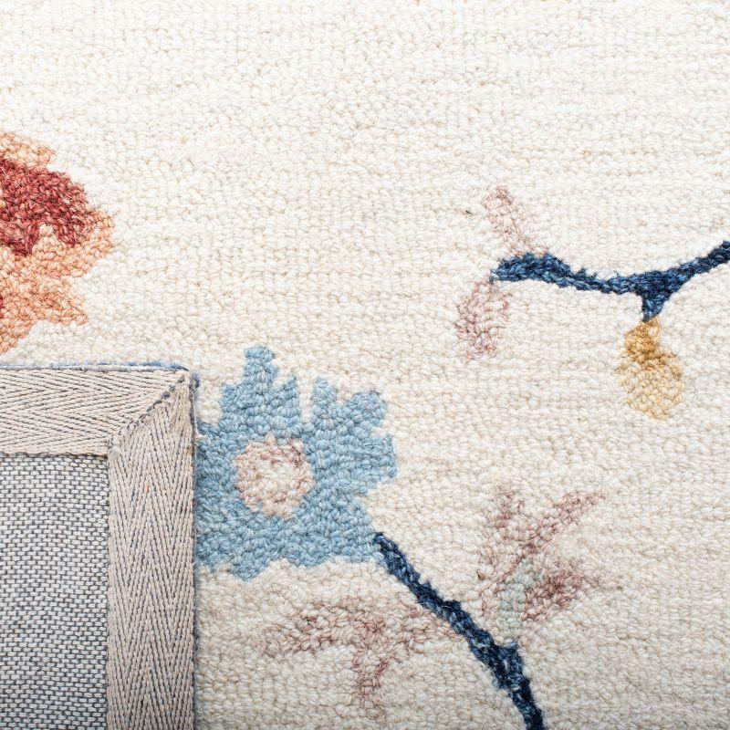 Metro MET120 Hand Tufted Area Rug - Ivory/Blue - 8'x10' - Safavieh.