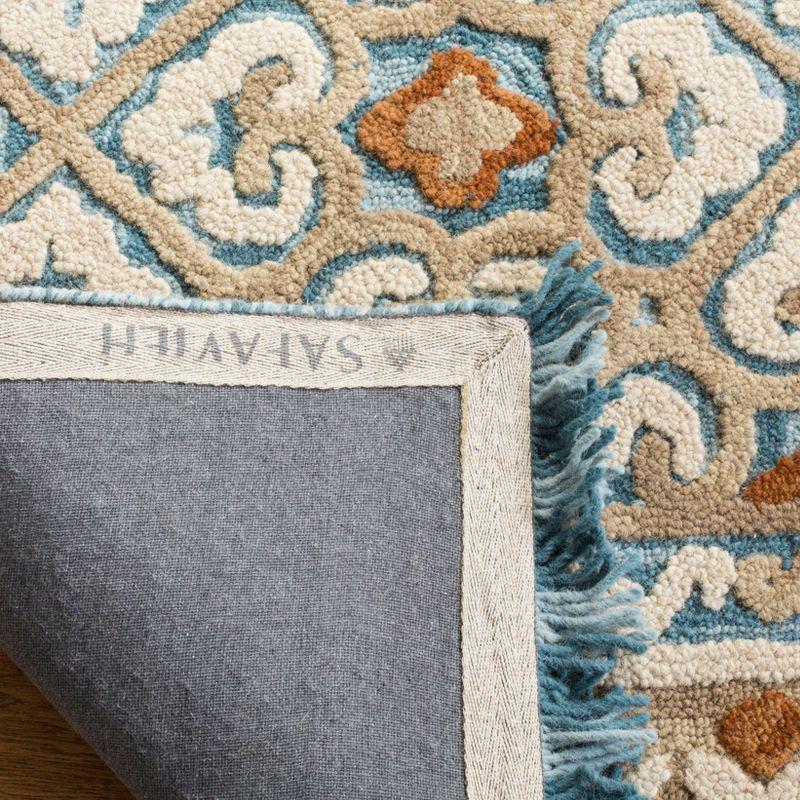 Blossom BLM420 Hand Tufted Area Rug - Ivory/Blue - 8'x10' - Safavieh.