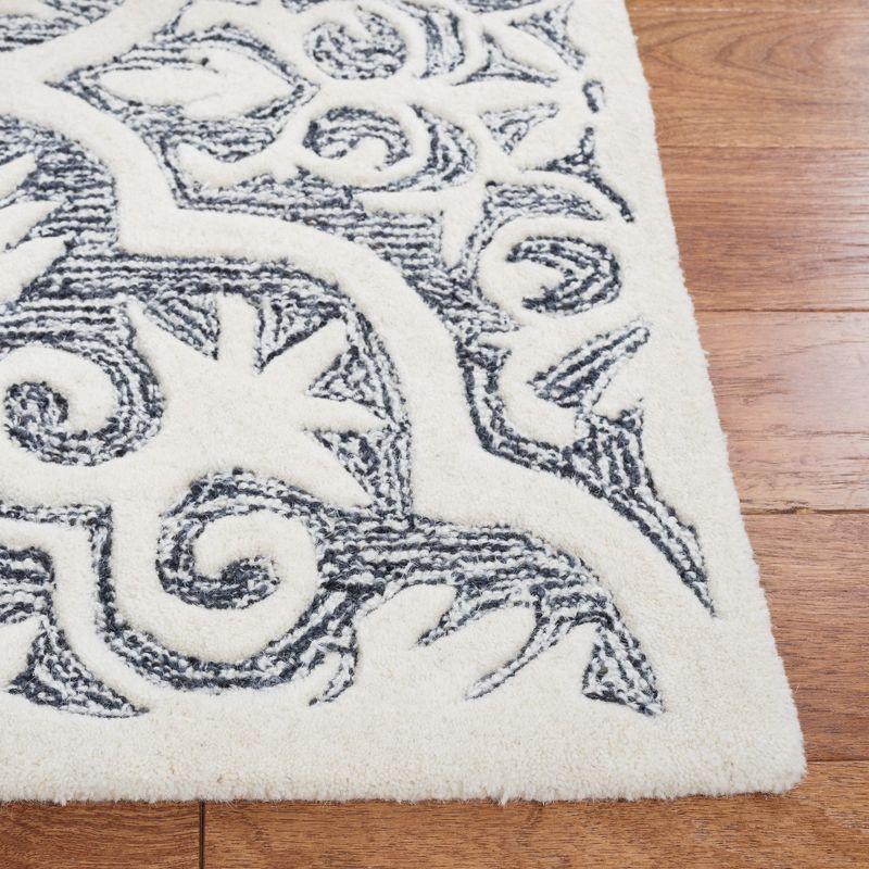 Metro MET859 Hand Tufted Area Rug  - Safavieh