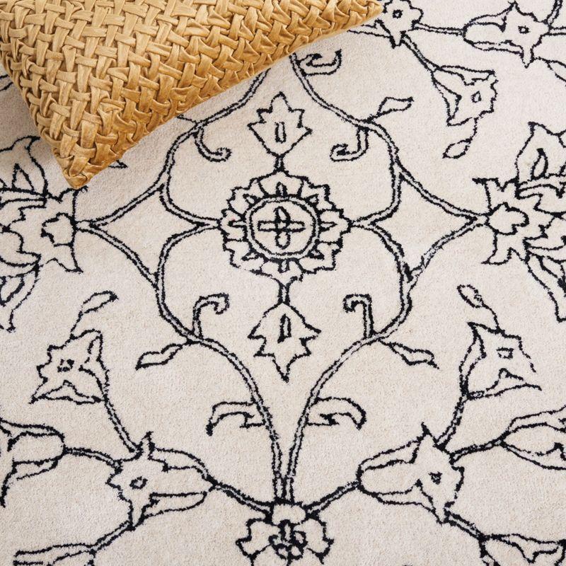 Jardin JAR730 Hand Tufted Area Rug - Ivory/Black - 8'x10' - Safavieh.