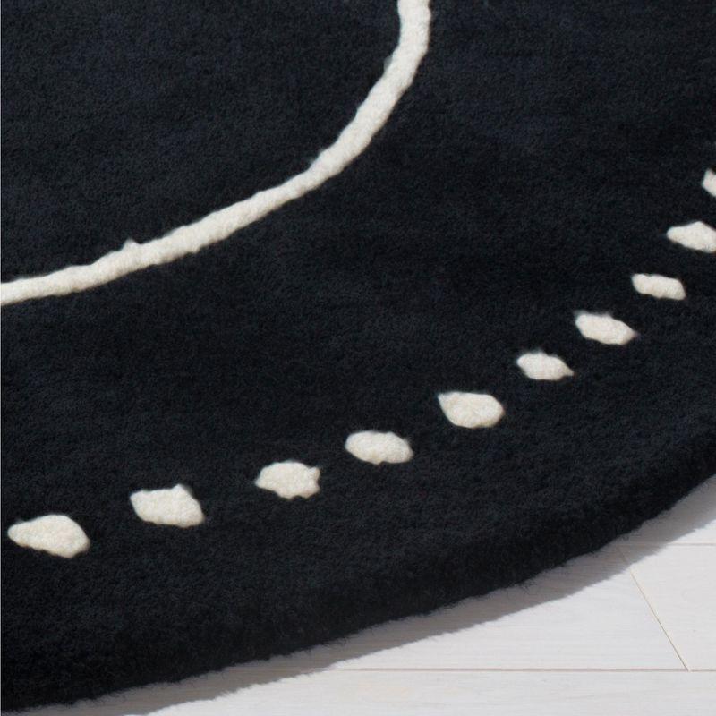 Bella BEL151 Hand Tufted Runner Rug - Black/Ivory - 2'3"x8' - Safavieh.