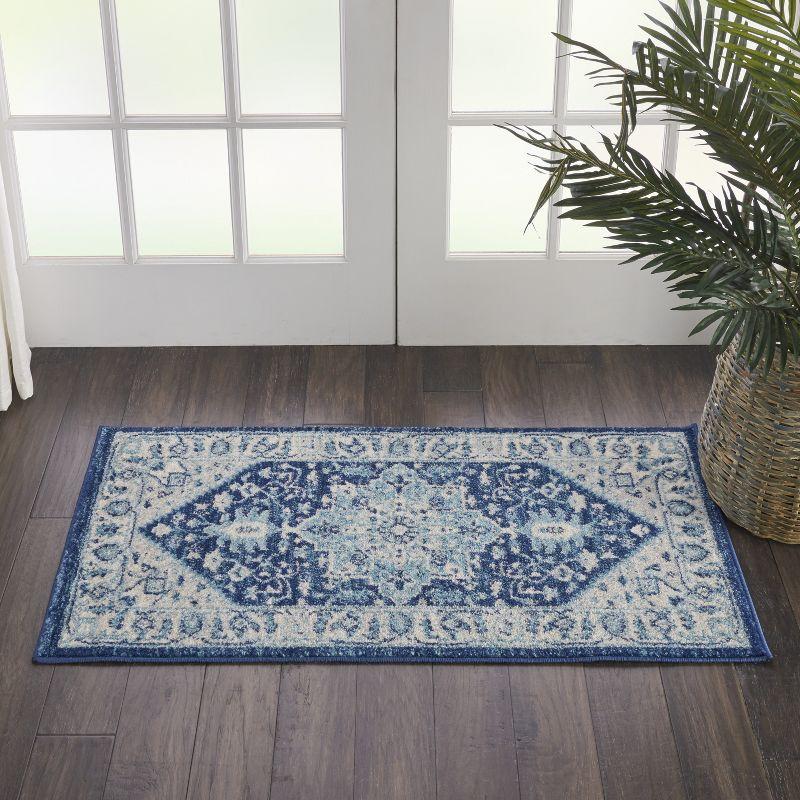 Ivory and Navy Synthetic 24'' Easy-Care Rectangular Area Rug