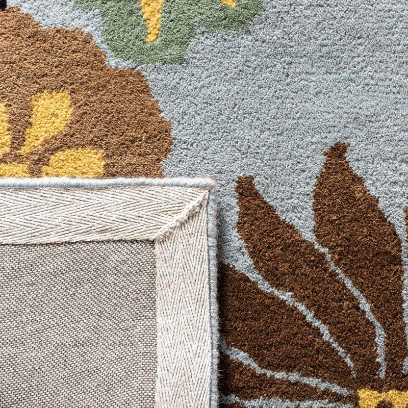 Soho SOH738 Hand Tufted Area Rug - Blue/Multi - 8'3"x11' - Safavieh.