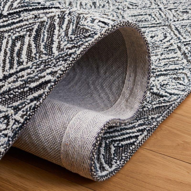 Textural TXT201 Hand Tufted Indoor Area Rug - Black/Ivory - 8'x10' - Safavieh