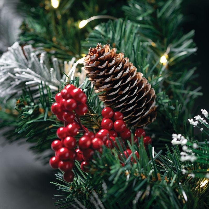 Sullivans 24 Inch Pre-lit Berry Pine Christmas Wreath Decorated with Pinecones, Light Flocking, and Warm White Twinkle Lights