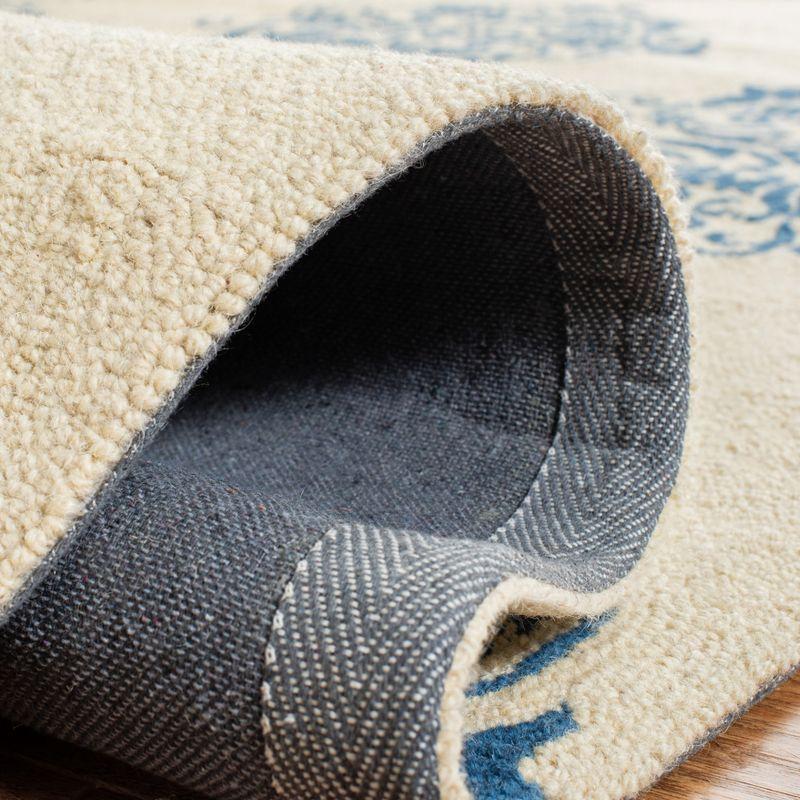 Chelsea HK145 Handmade Area Rug - 3'9"x5'9" - Ivory/Blue - Safavieh
