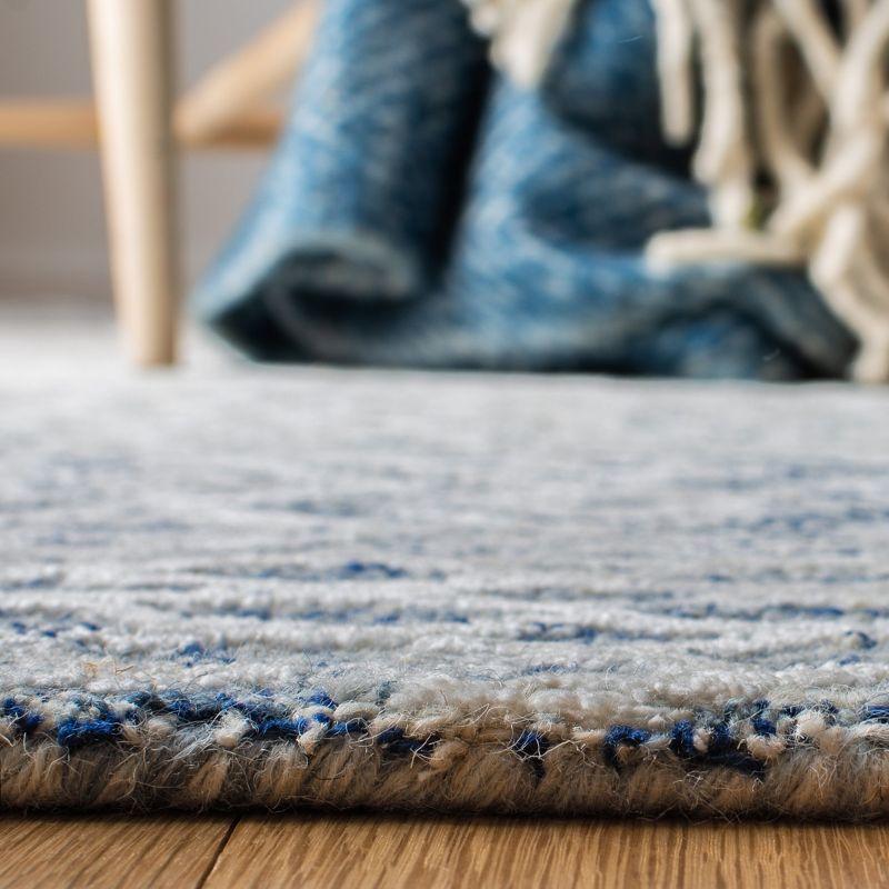 Handmade Blue Wool and Viscose 8' x 10' Tufted Area Rug