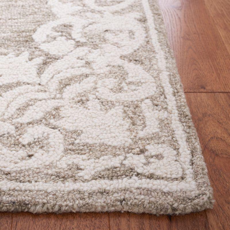 Ivory Abstract Tufted Wool 8' x 10' Rectangular Area Rug