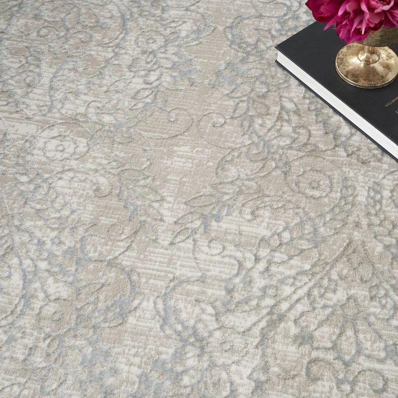 Iliana Damask Machine Woven Polyester Area Rug in Beige