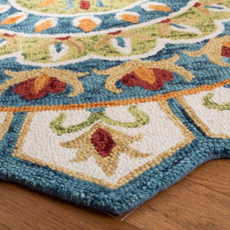 Novelty NOV605 Hand Tufted Area Rug - Ivory/Blue - 4' round - Safavieh.