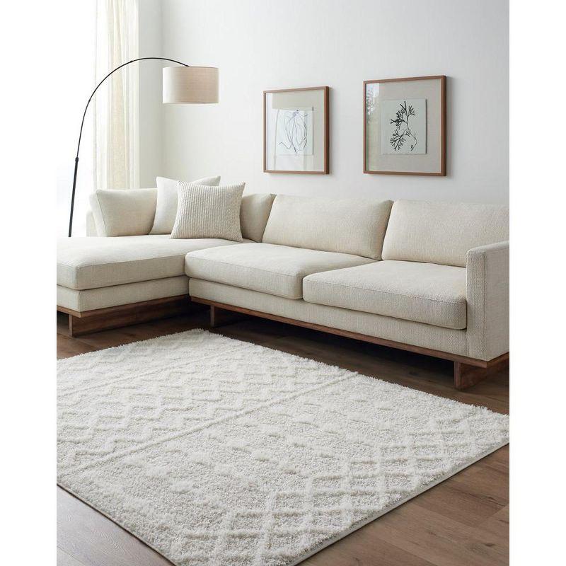 Daris Cream Geometric Polyester Area Rug 5'3" x 7'