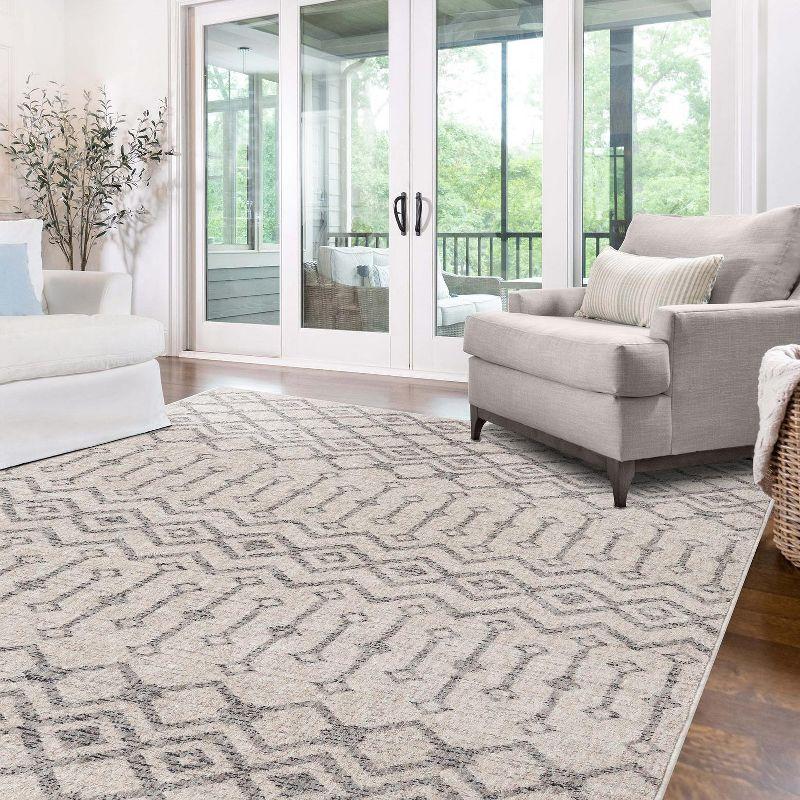 Eco-Friendly Ivory Geometric 4' x 6' Synthetic Area Rug