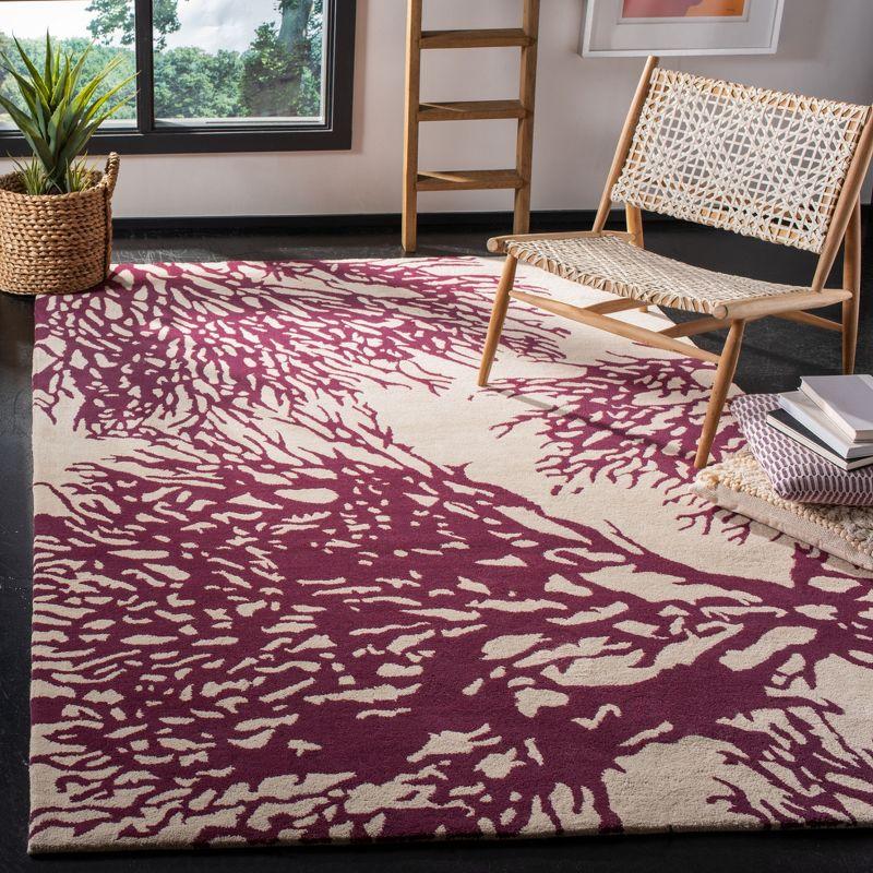 Beige and Purple Hand-Tufted Wool 6' x 9' Area Rug