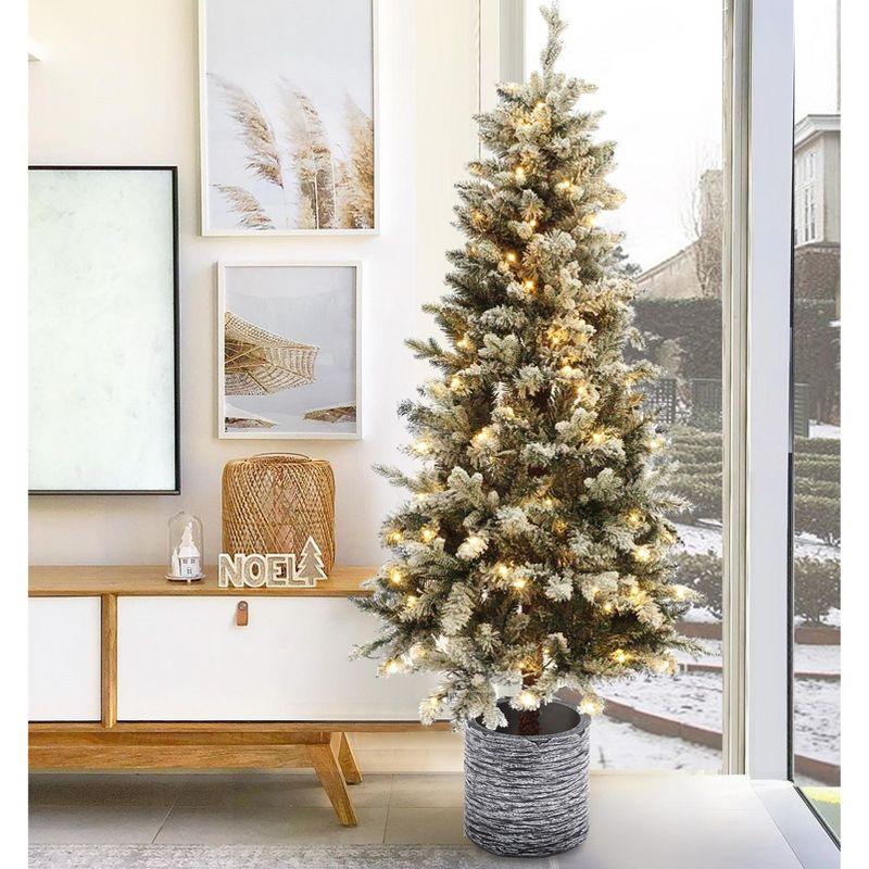 LuxenHome 5.6Ft Pre-Lit Artificial Flocked Christmas Tree, Slim Fir Tree with Lights and Gray Pot Off-White