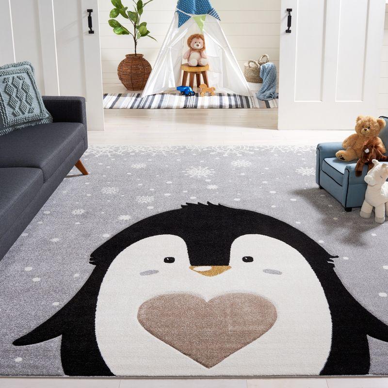 Whimsical Penguin Parade 8' x 10' Light Grey Synthetic Area Rug for Kids