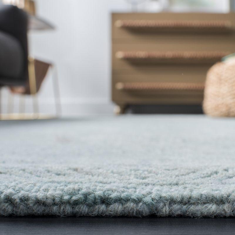 Ikat IKT506 Hand Tufted Area Rug - Aqua - 5'x8' - Safavieh