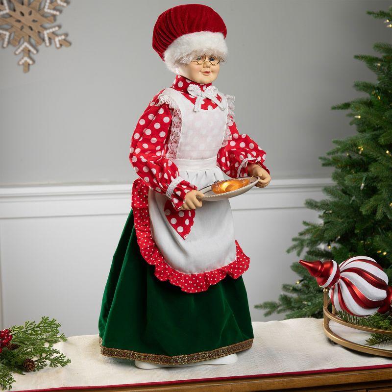 Mrs. Claus with Gingerbread Cookie Figure