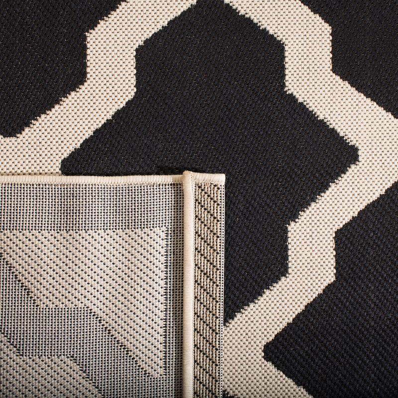 Elegant Scallop Lattice 9' x 12' Black Synthetic Area Rug