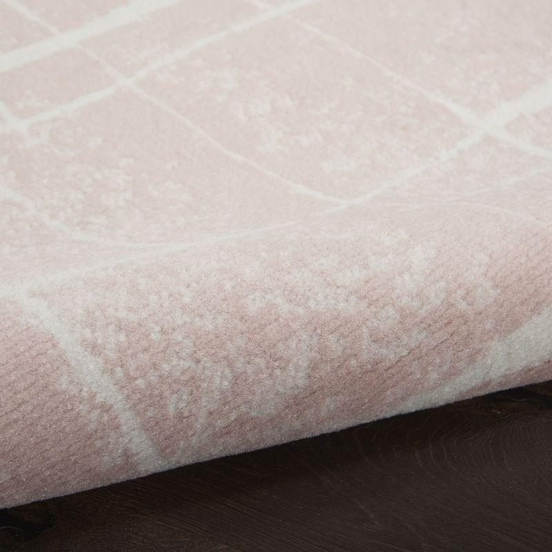 Ivory and Pink Abstract Synthetic 6' x 9' Area Rug