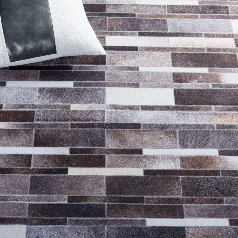 Faux Hide FAH542 Power Loomed Machine Washable Area Rug - Ivory/Grey - 6'x9' - Safavieh.