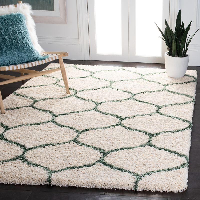 Ivory and Green Round Shag Rug with Geometric Pattern