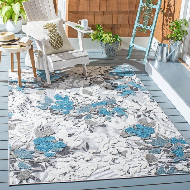 Beige and Blue Floral Synthetic Indoor/Outdoor Rug