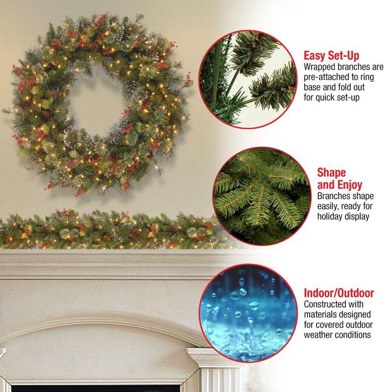 48" Prelit Wintry Pine Artificial Wreath with Pine Cones, Berries & Snowflakes Clear Lights - National Tree Company