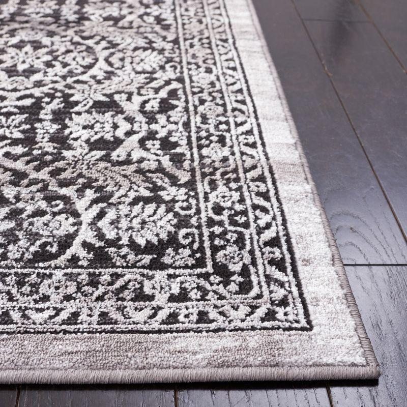 Charcoal and Ivory Synthetic Bohemian Area Rug