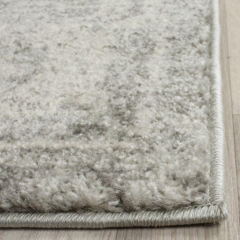 Silver and Ivory Rectangular Synthetic Area Rug