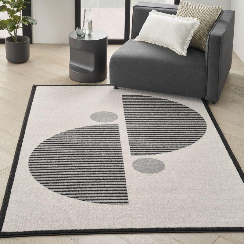 Nourison Modern Passion Circle Mid-Century Modern Indoor Rug Ivory/Black 6' x 9'