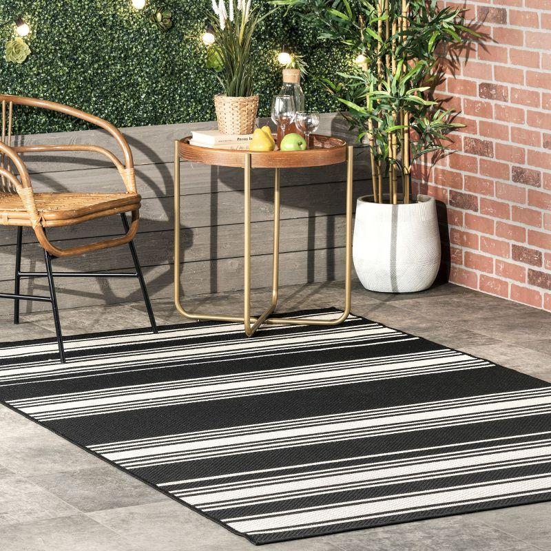 Black and White Striped Synthetic 5' x 8' Indoor/Outdoor Rug