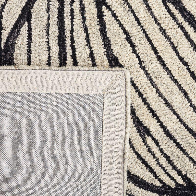 Metro MET451 Hand Tufted Indoor Area Rug - Black/Ivory - 4'x6' - Safavieh