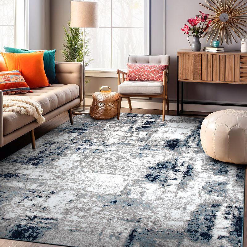 Reversible Blue Abstract Synthetic 5' x 7' Easy-Care Area Rug