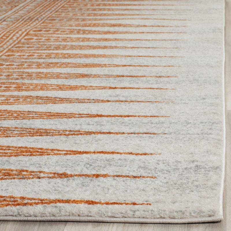 Evoke EVK226 Power Loomed Accent Rug Ivory / Orange 2'-2" X 4' - Safavieh.