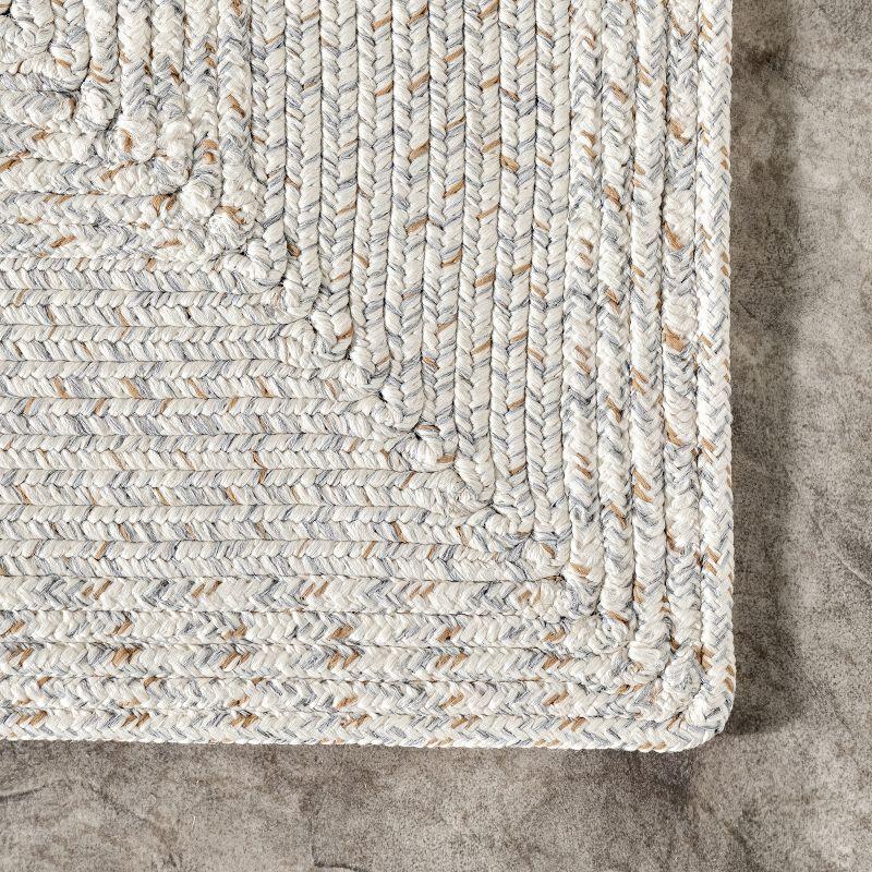 Ivory Braided Synthetic 5' x 8' Easy-Care Indoor/Outdoor Rug