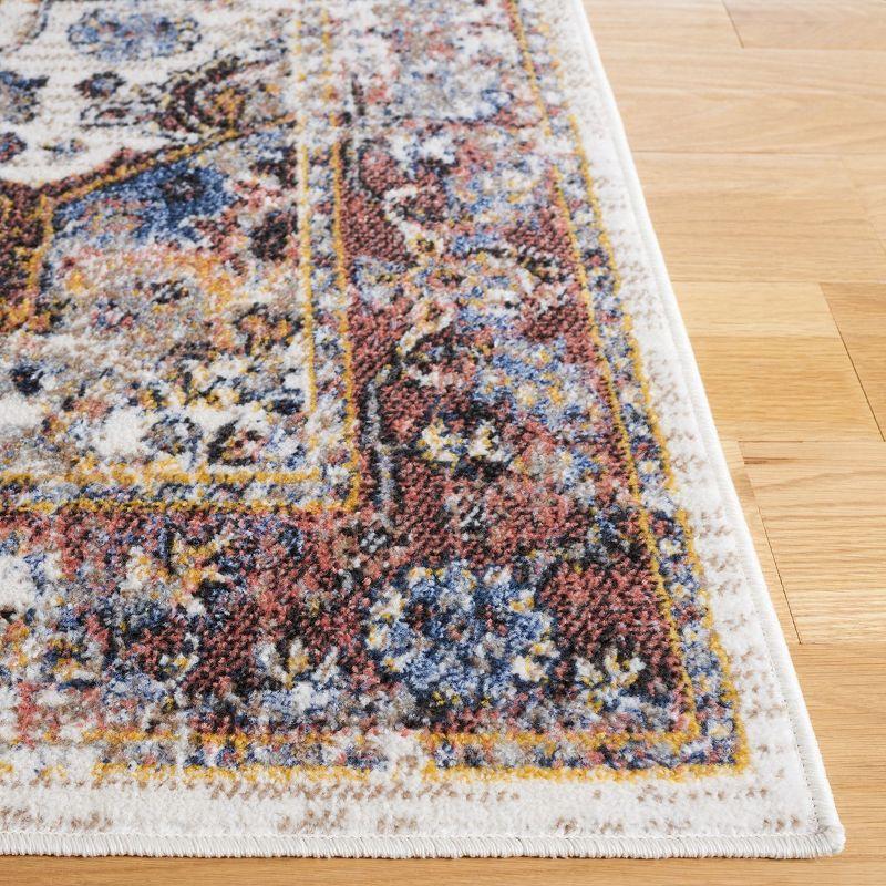 Ivory and Blue Rust Traditional 4' x 6' Synthetic Area Rug