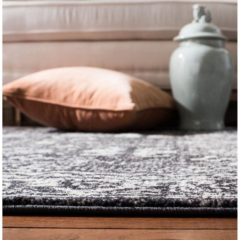 Evoke EVK270 Power Loomed Area Rug Charcoal / Ivory 5'-3" X 7'-6" - Safavieh.