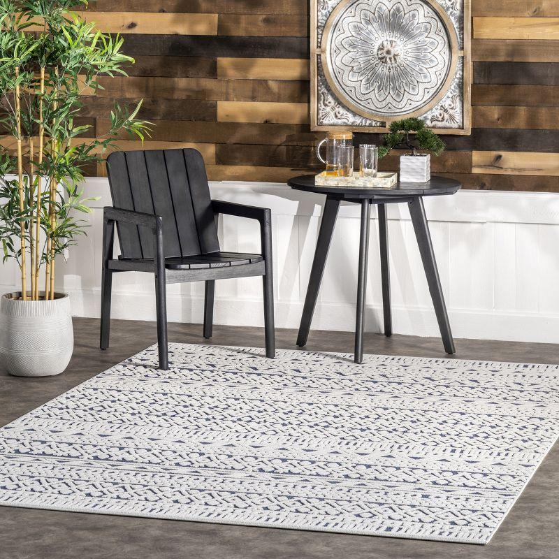 Contemporary Flair Blue Geometric Synthetic Area Rug, 6'7" x 9'