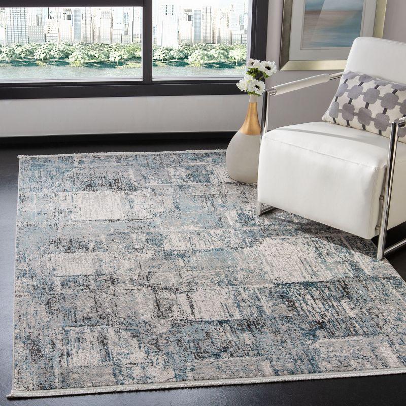 Abstract Blue Synthetic 59" Hand-Knotted Area Rug