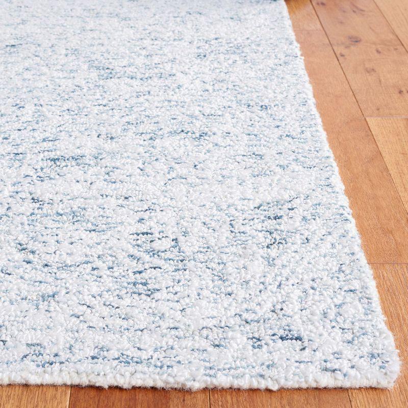 Light Blue Hand Tufted Wool and Synthetic Area Rug, 4' x 6'