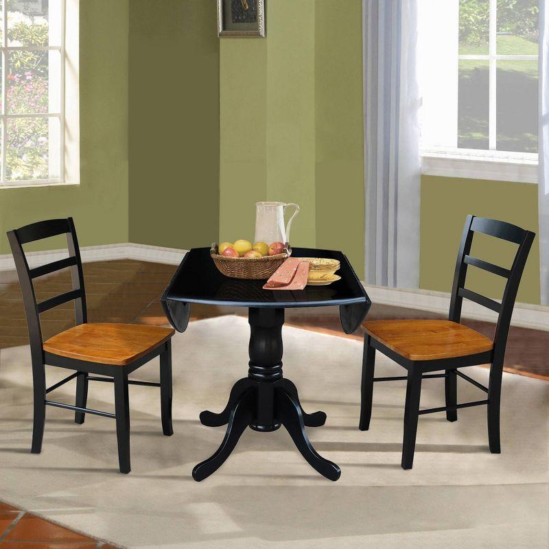 3pc Dining Set with a Dual Drop Leaf Dining Table with 2 Ladder Back Dining Chairs Black/Cherry - International Concepts: Round Table, Rubberwood