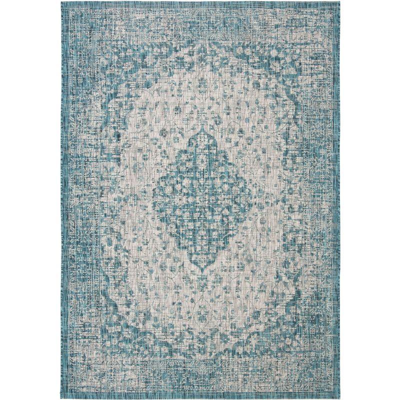 Teal and Cream Synthetic Indoor/Outdoor Area Rug