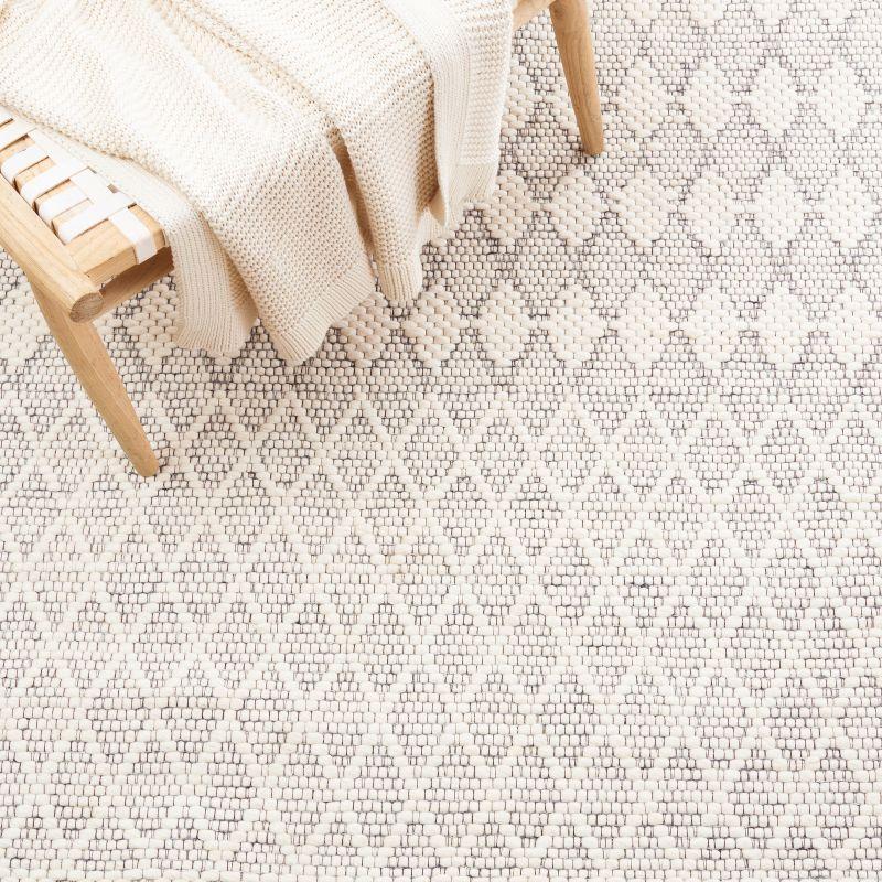 Ivory Flat Woven Wool Rectangular Area Rug