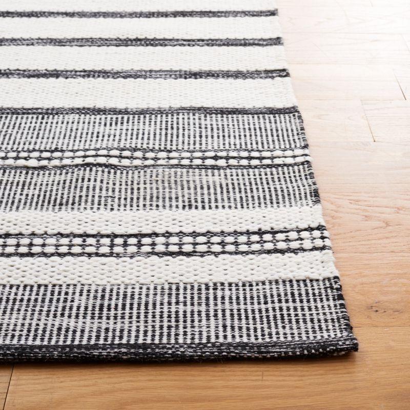 Bohemian Ivory and Black Handwoven Synthetic Stripe Area Rug 4' x 6'