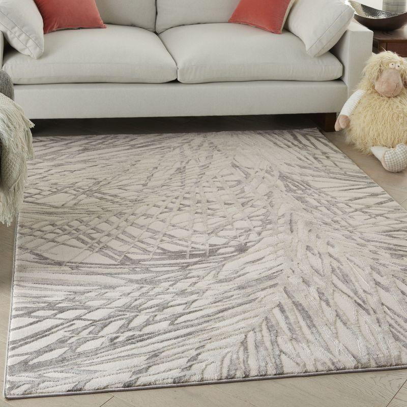 Ivory Abstract Synthetic 4' x 6' Easy Care Rug