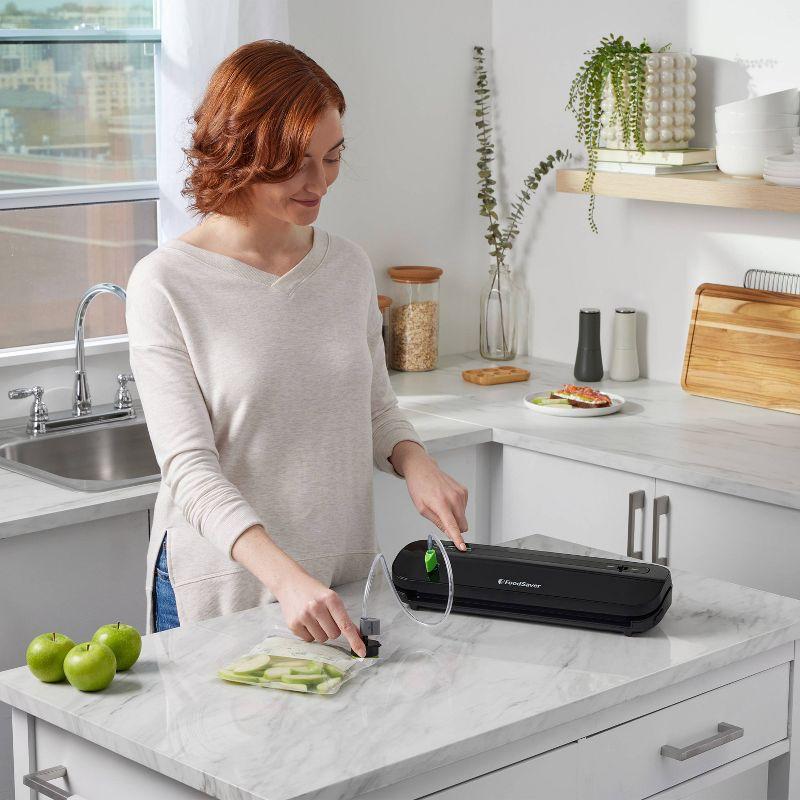 FoodSaver Space-Saving Vacuum Sealer with Bags and Roll Black: Compact Food Savers Vacuum System, Plastic & Metal
