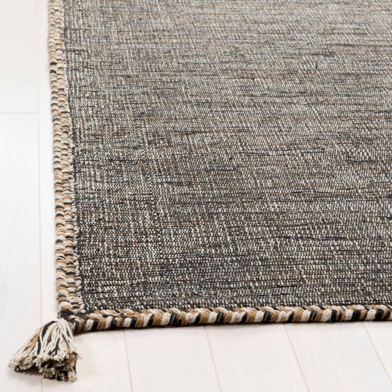 Coastal Charm Black and Beige Handwoven Cotton Area Rug - 27" x 4"