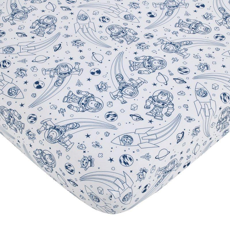 NoJo Disney Toy Story Outta This World Blue and Gray 3 Piece Nursery Crib Bedding Set - Comforter,  Fitted Crib Sheet, and Crib Skirt